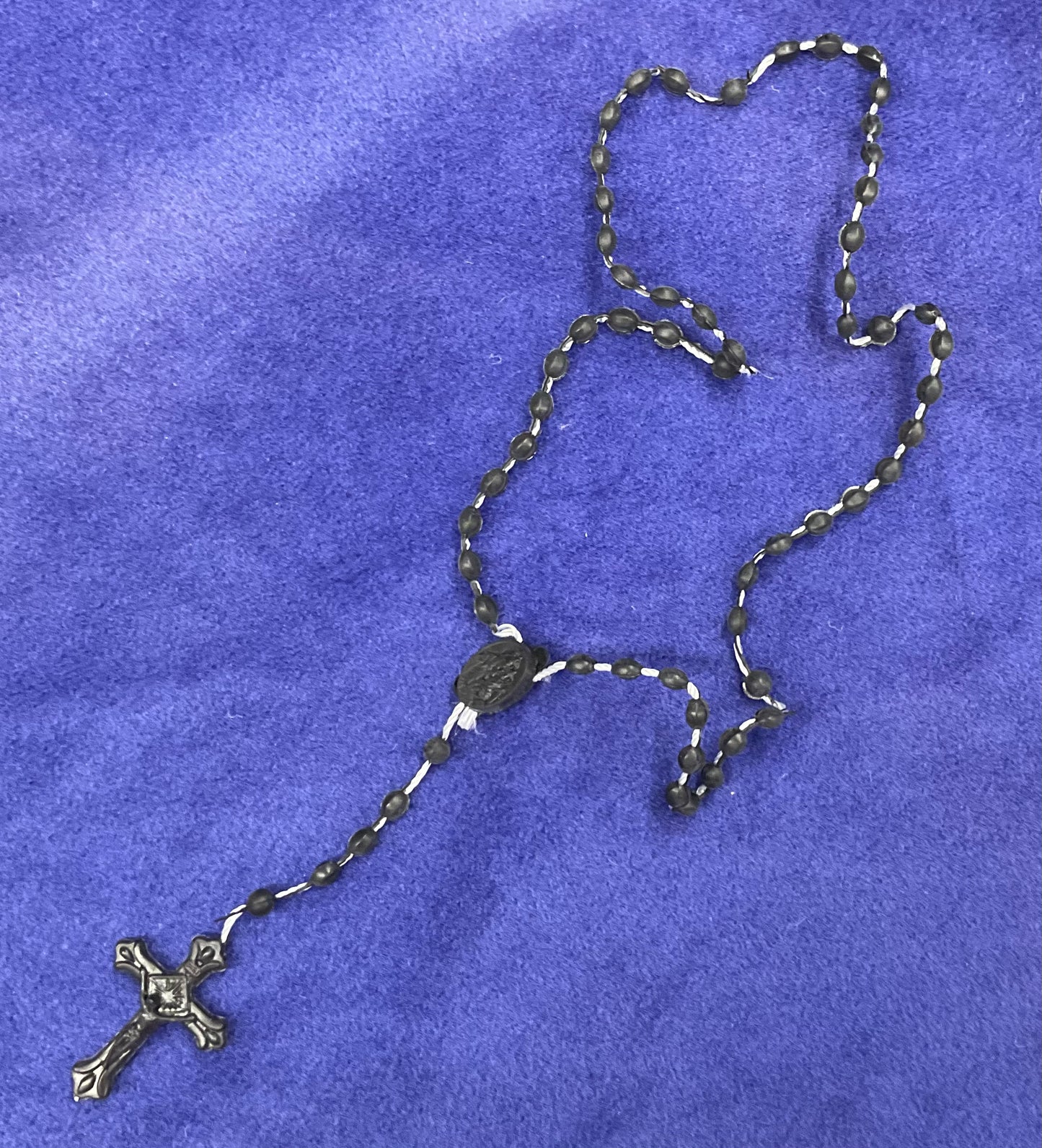 Black plastic cord rosary